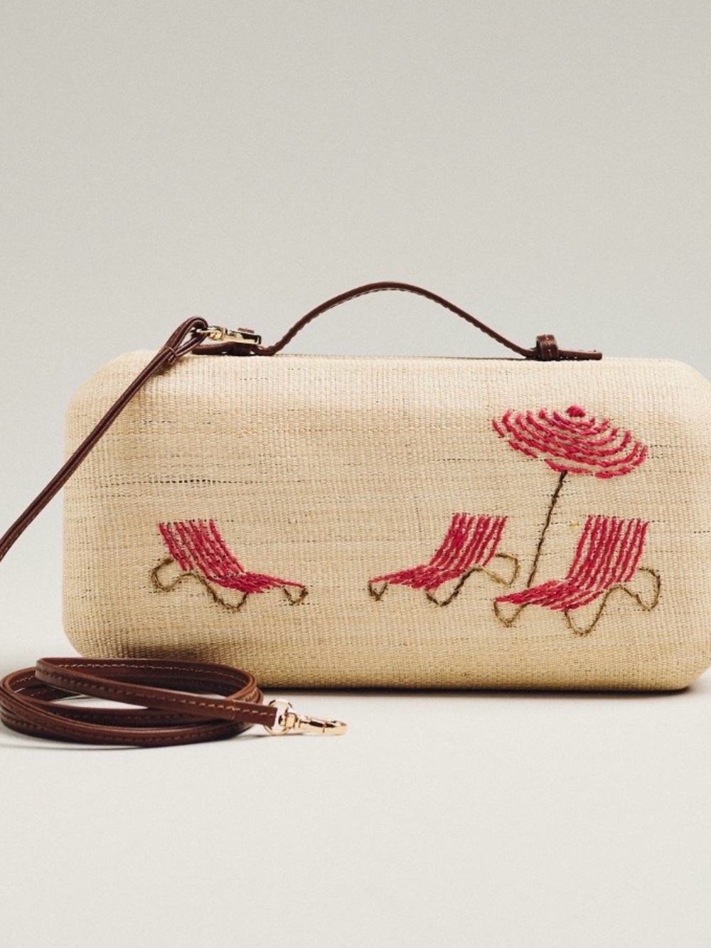 Poolside Straw Clutch with red beach chair Accent